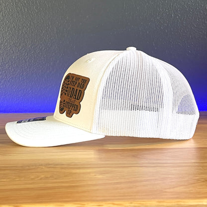 I'M NOT THE STEP DAD, IM THE DAD THAT STEPPED UP Leather Patch Trucker Hat White