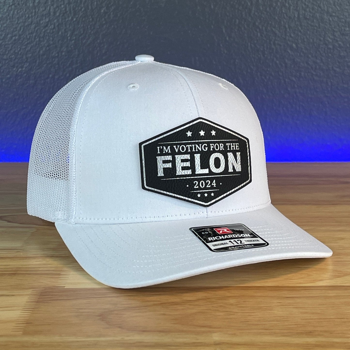 IM VOTING FOR THE FELON Trump 2024 Leather Patch SnapBack Trucker Hat Black/Silver - Hollow Point Society