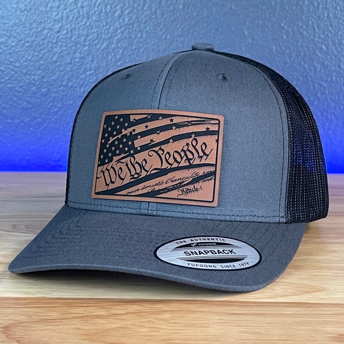 We The People American Flag Patriotic SnapBack Trucker Rawhide Leather Patch Hat Charcoal Patch Hat