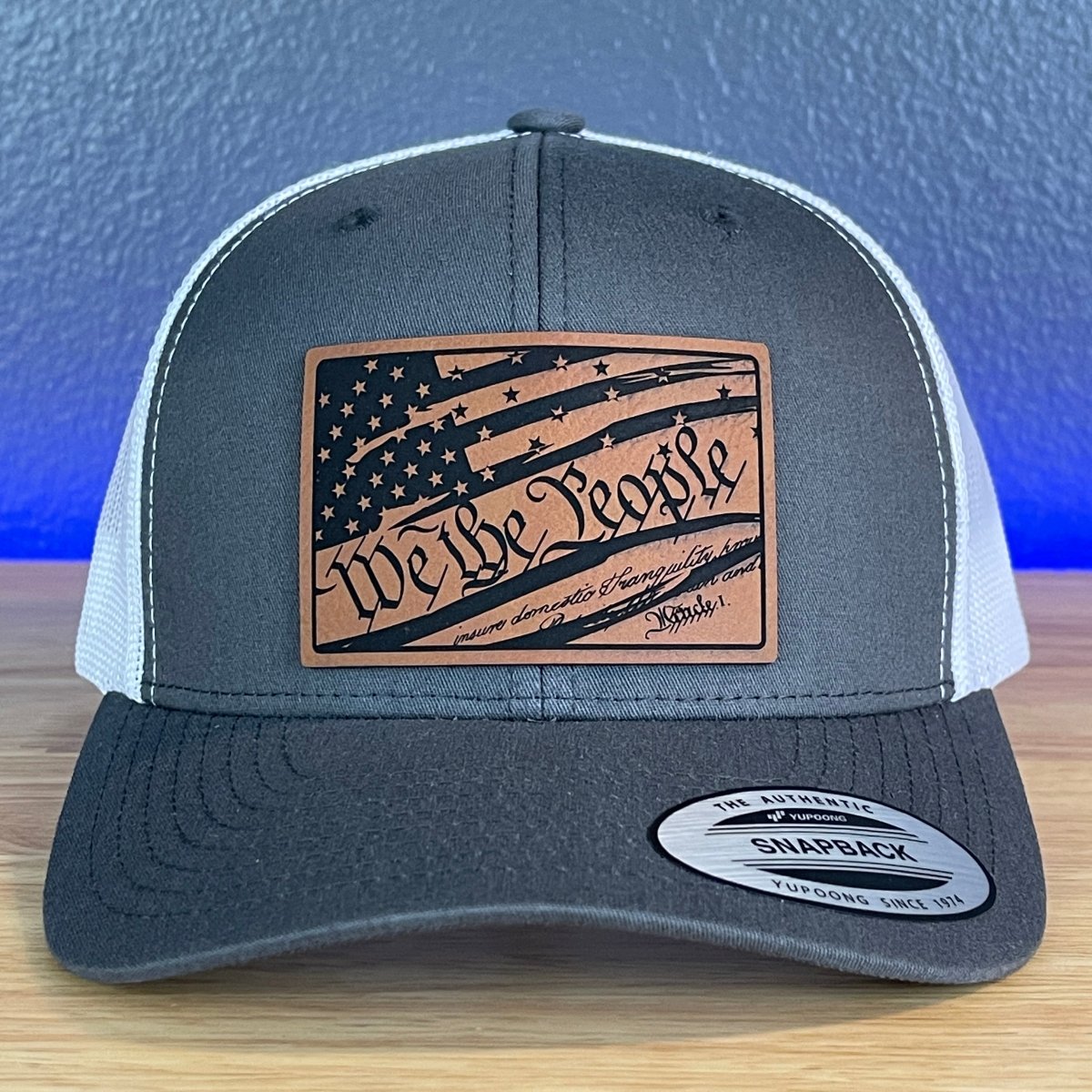 We The People American Flag Patriotic SnapBack Trucker Rawhide Leather Patch Hat Charcoal/White Patch Hat