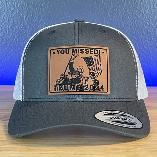 You Missed Trump 2024 SnapBack Trucker Hat Square Rawhide Leather Patch Charcoal/White Patch Hat