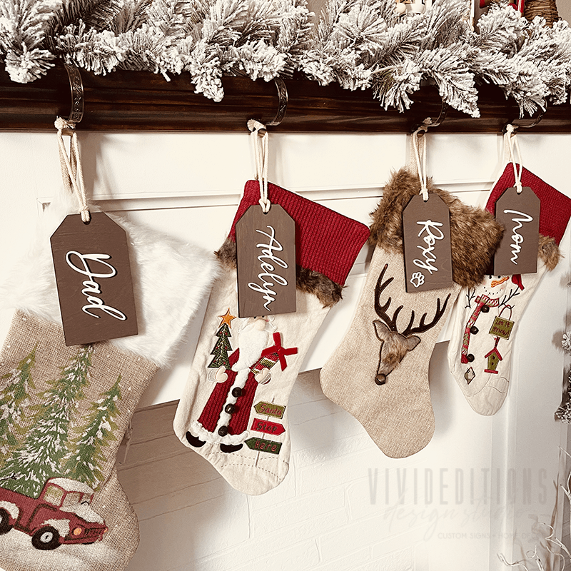 https://www.vivideditions.com/cdn/shop/products/layered-personalized-christmas-stocking-name-tag-vivideditions-202339.png?v=1691164484
